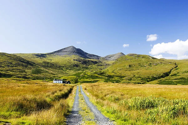 An isolated house beneath Ben More on Mull, Scotland, UK. August 2014