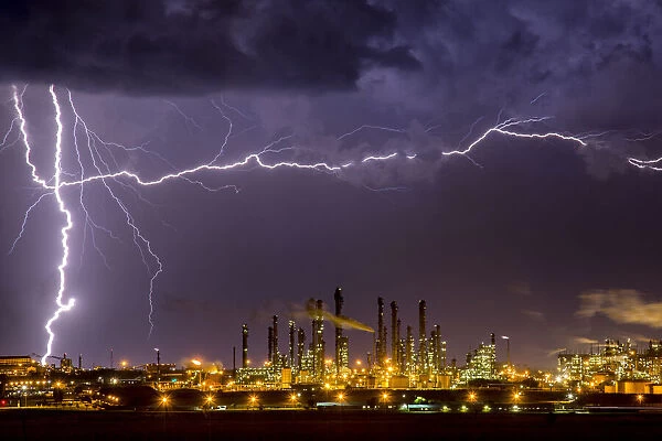 Lightning strike over South Africa's largest coal processing plant. Sasol, Mpumalanga, South Africa, November, 2016