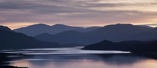 Loch Hope with hills silhouetted at sunset, Loch Hope, Sutherland, Scotland, November 2014