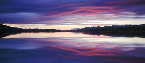 Sunset over Loch Insh, Cairngorms National Park, Scotland, UK, October 2013