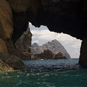 Furadinho cave, regularly visited by Monk seal (Monachus monachus) with view of Bugio Island