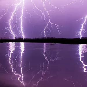 Lightning storm over Lake Csaj, Kiskunsagi National Park, Pusztaszer, Hungary. May 2012