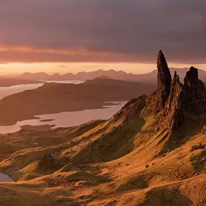 The Old Man of Storr, golden early morning light, the Trotternish peninsula, Isle of Skye, Scotland, UK. November 2017