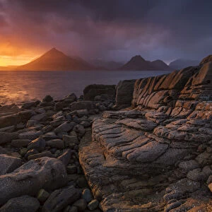 Sunset over the Cullin Mountains from Elgol shoreline, Isle of Skye, Scotland, UK, April
