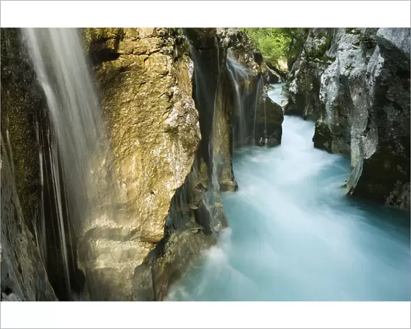 River Soca flowing through Velika korita with waterfalls, Triglav National Park, Slovenia