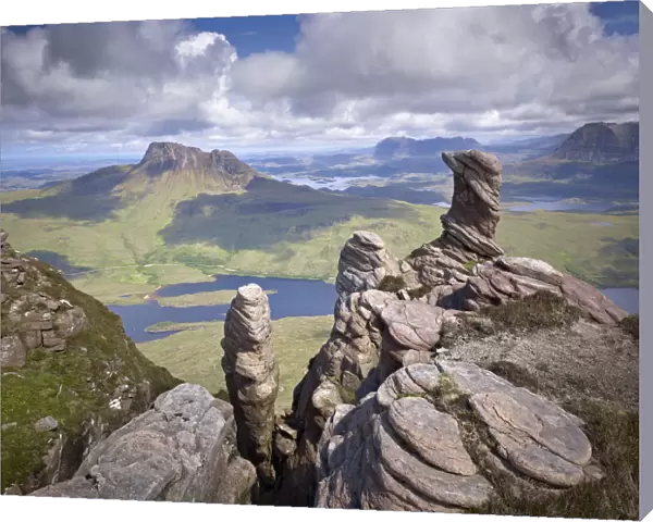 View from summit of Sgorr Tuath, sandstone pinnacles, Assynt mountains, Highland