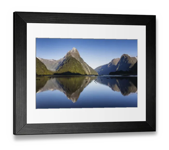 Framed Print : Early morning light on Mitre Peak (1683m) reflected in the calm waters of Milford Framed Print : Early morning light on Mitre Peak (1683m) reflected in the calm waters of Milford