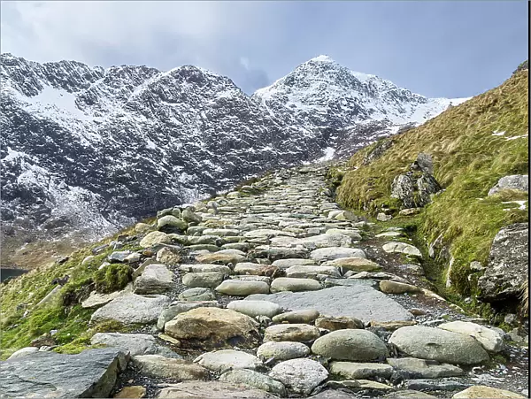 The Miners Track up Mount Snowdon on the right, with the summit back right. Snowdonia National Park, North Wales, UK, March