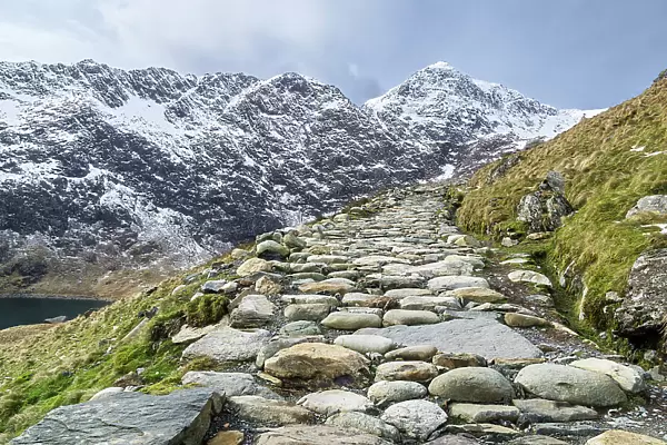 The Miners Track up Mount Snowdon on the right, with the summit back right. Snowdonia National Park, North Wales, UK, March