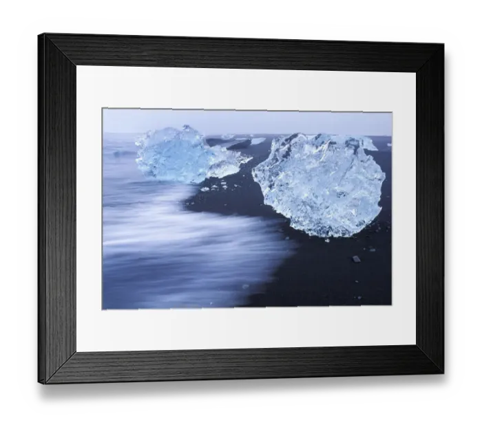 Framed Print : Pieces of iceberg calved from Vatnajokull glacier on black sand beach, Iceland 2005 Framed Print : Pieces of iceberg calved from Vatnajokull glacier on black sand beach, Iceland 2005