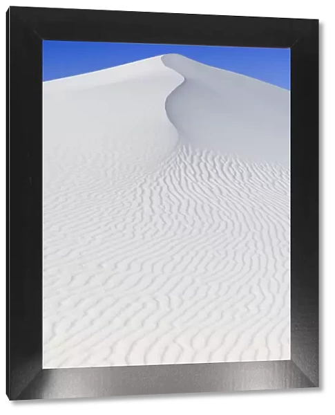 White sand dunes against blue sky, White Sands National Monument, New Mexico, USA