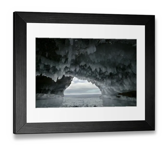 Framed Print : Ice hanging from arch in sea cave carved in soft sandstone cliffs, frozen lake, Squaw Bay Framed Print : Ice hanging from arch in sea cave carved in soft sandstone cliffs, frozen lake, Squaw Bay