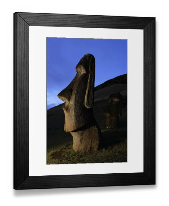 Framed Print : Moai stone statue at dusk on the slopes of the quarry at Rano Raraku volcano, Easter Framed Print : Moai stone statue at dusk on the slopes of the quarry at Rano Raraku volcano, Easter