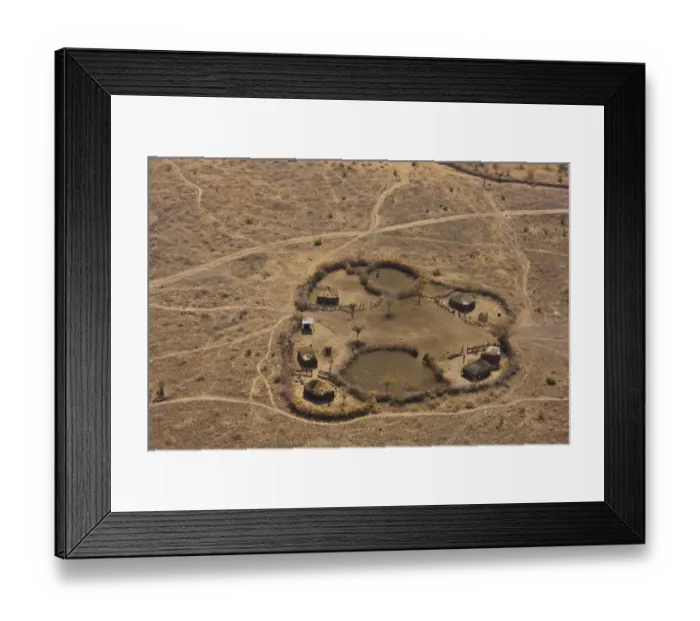 Framed Print : Aerial view of Msai fenced homestead, with buildings and livestock enclosures. Kenya Framed Print : Aerial view of Msai fenced homestead, with buildings and livestock enclosures. Kenya