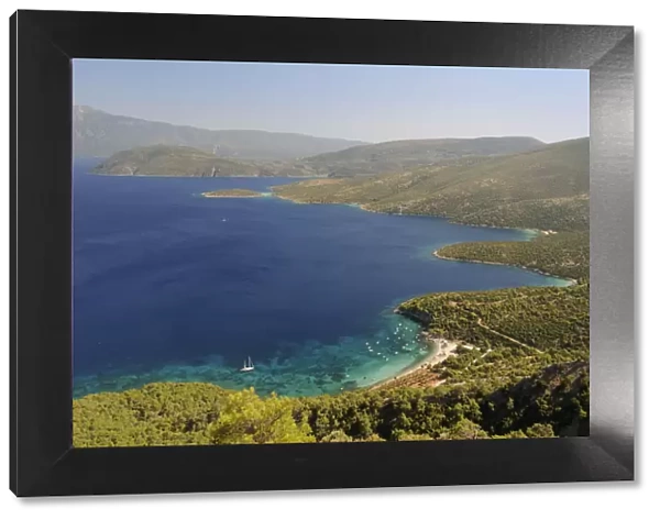 Mourtia beach and bay with the southeast tip of Samos and Mount Mycale in Turkey s
