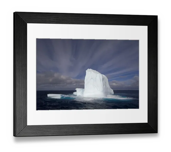Framed Print : Huge iceberg with streaked sky under expansive open sky Framed Print : Huge iceberg with streaked sky under expansive open sky