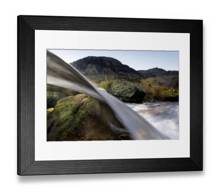Framed Print : A split-level view through a small waterfall, Llanberis, Snowdonia NP, Gwynedd, Wales Framed Print : A split-level view through a small waterfall, Llanberis, Snowdonia NP, Gwynedd, Wales