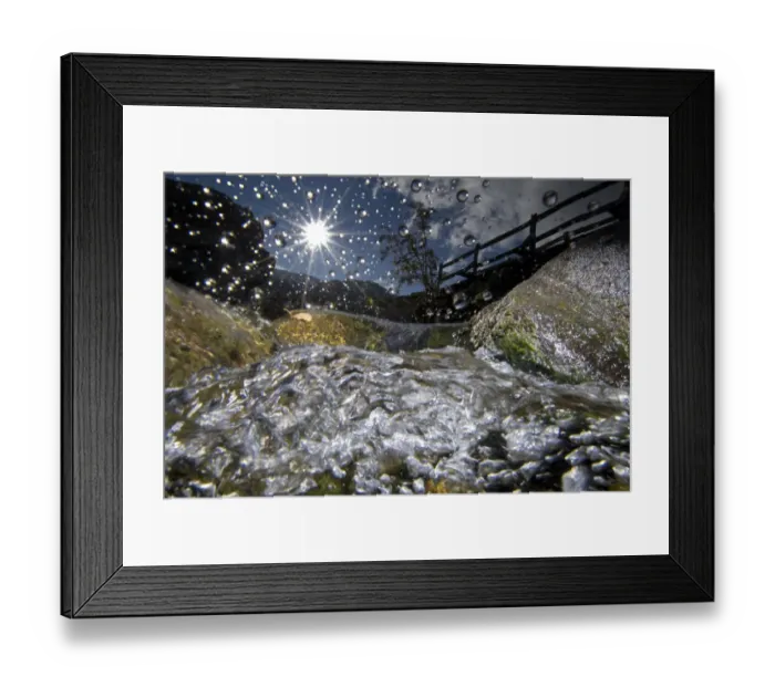 Framed Print : A split-level image of a mountain stream, in autumn, with water droplets on lens