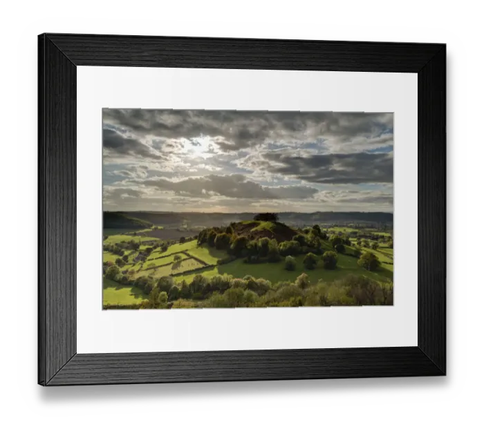 Framed Print : Downham Hill, a jurassic limestone outlier on the edge of the Cotswolds AONB conservation area Framed Print : Downham Hill, a jurassic limestone outlier on the edge of the Cotswolds AONB conservation area