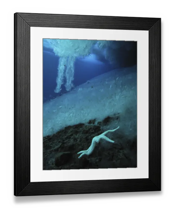 Framed Print : Brinicles (brine icicles or ice stalactites) forming under the ice, growing towards the sea floor