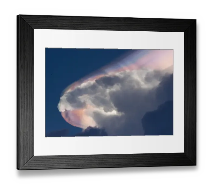 Framed Print : Cloud iridescence forming above a cumulonimbus cloud, caused by light refraction Framed Print : Cloud iridescence forming above a cumulonimbus cloud, caused by light refraction