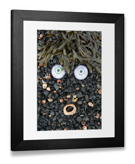 Framed Print : Troll face amongst seaweed, Islay, Scotland