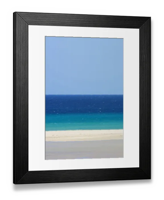 Framed Print : Sandy beach and bright blue ocean, Fuerteventura, Canary Islands. April 2013 Framed Print : Sandy beach and bright blue ocean, Fuerteventura, Canary Islands. April 2013