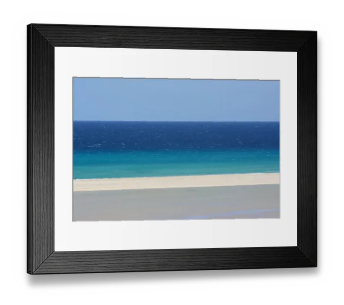 Framed Print : Sandy beach and bright blue ocean, Fuerteventura, Canary Islands. April 2013 Framed Print : Sandy beach and bright blue ocean, Fuerteventura, Canary Islands. April 2013