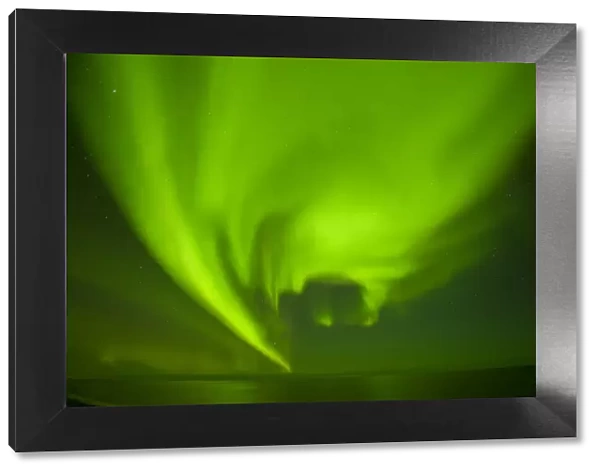 Green Aurora borealis over the Beaufort Sea, seen from the 1002 area of the Arctic