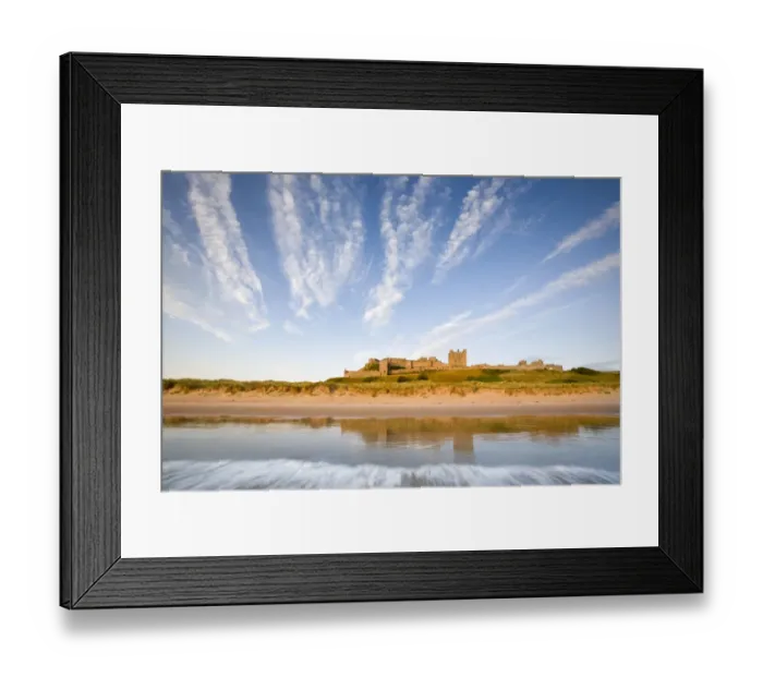 Framed Print : Bamburgh Castle shortly after high tide, Northumberland, UK. July 2009 Framed Print : Bamburgh Castle shortly after high tide, Northumberland, UK. July 2009