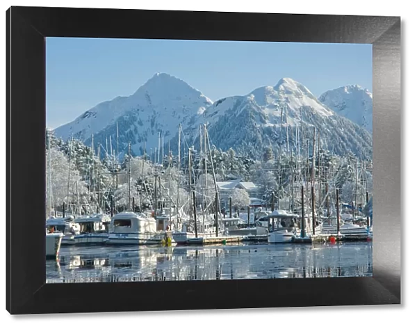 Snow covered fishing boats in Sitka Harbour, Alaska