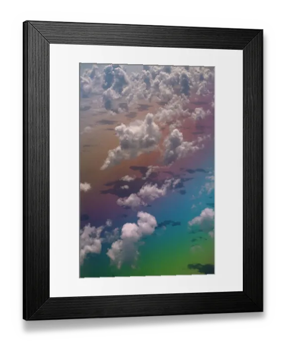 Framed Print : Looking down onf Clouds over Atlantic Ocean with rainbow colours Framed Print : Looking down onf Clouds over Atlantic Ocean with rainbow colours