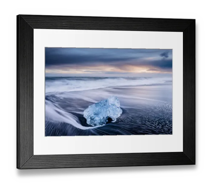 Framed Print : Ice on black volcanic sand beach with waves, Jokulsarlon, Southeast Iceland, February Framed Print : Ice on black volcanic sand beach with waves, Jokulsarlon, Southeast Iceland, February