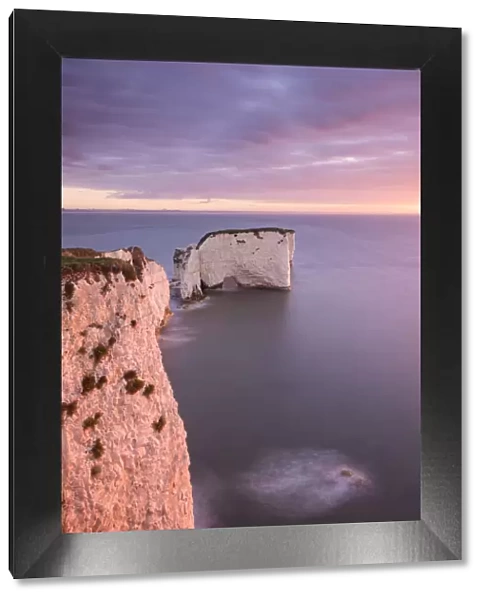 Old Harry Rocks at dawn, looking towards the Isle of Wight, Studland, Dorset, England, UK