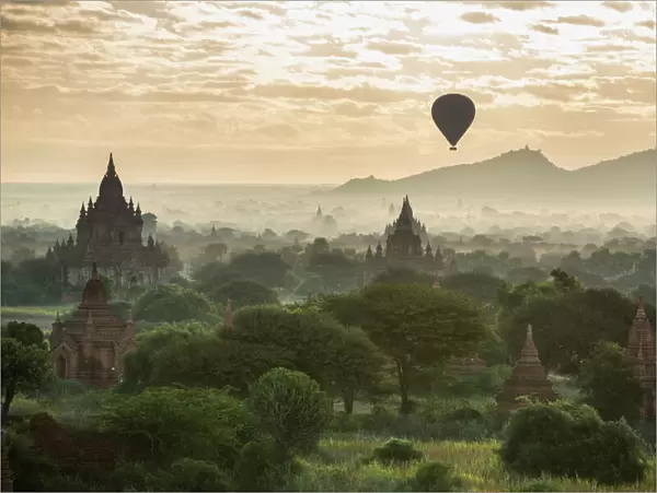 Hot air balloon over the Temples of Bagan at dawn, Myanmar, November 2012