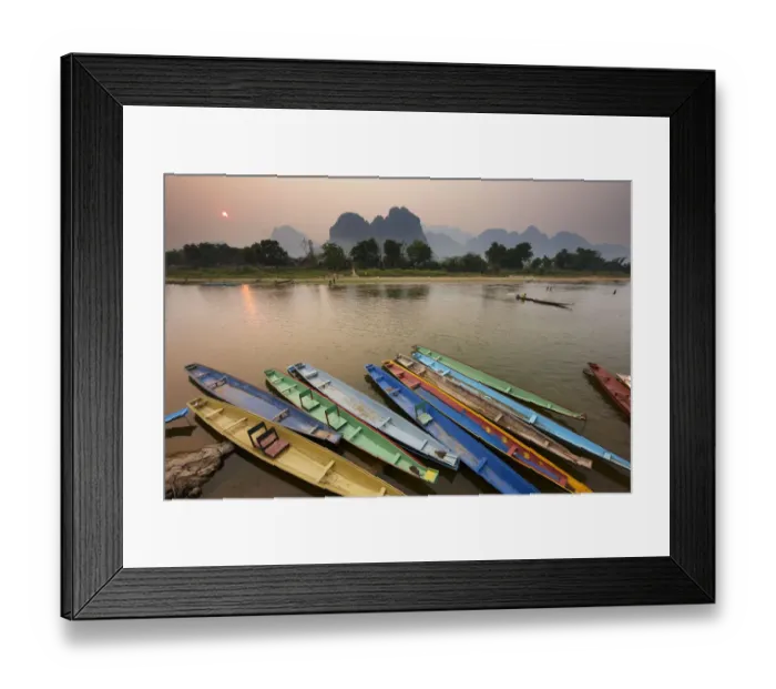 Framed Print : Canoes on the moored on the Nam Song River at Vang Vieng, Laos, March 2009 Framed Print : Canoes on the moored on the Nam Song River at Vang Vieng, Laos, March 2009