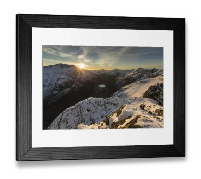 Framed Print : Sunset over snow covered mountains, view north west along Aonach Eagach ridge towards Glen Coe