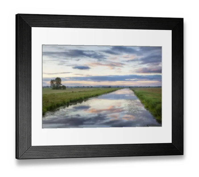 Framed Print : Sunrise with reflection of clouds in Kings Sedgemoor Drain, Greylake, Somerset Levels