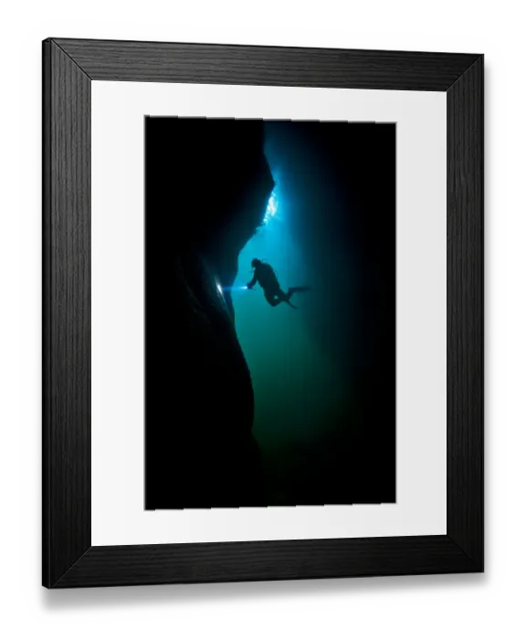 Framed Print : Scuba diver exploring a sea cave beneath Giants Legs, Bressay, Shetland Islands, Scotland Framed Print : Scuba diver exploring a sea cave beneath Giants Legs, Bressay, Shetland Islands, Scotland