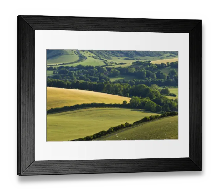 Framed Print : View of downland and arable farmland from Wilmington Hill, Wilmington, South Downs National Park Framed Print : View of downland and arable farmland from Wilmington Hill, Wilmington, South Downs National Park