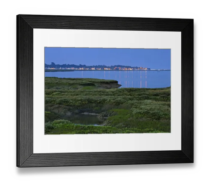 Framed Print : Saltmarsh at twilight, with lights of Bradwell-on-Sea in the background, Abbotts Framed Print : Saltmarsh at twilight, with lights of Bradwell-on-Sea in the background, Abbotts