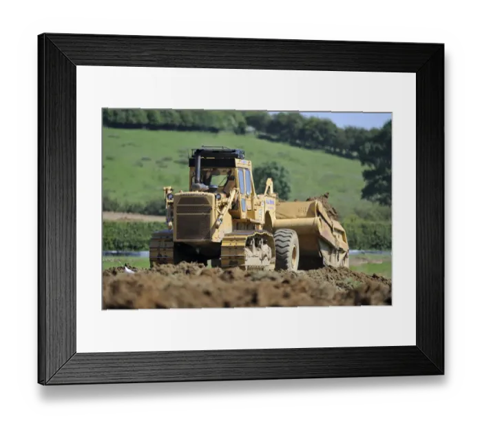 Framed Print : Machine creating earth embankment for lagoon at Rutland Water. Summer 2010