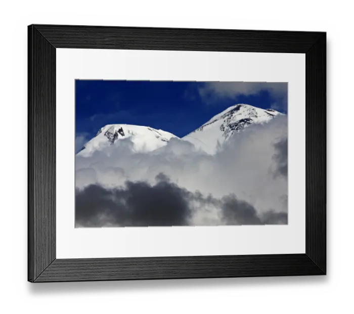 Framed Print : Mount Elbrus, the highest mountain in Europe (5, 642m) surrounded by clouds, seen
