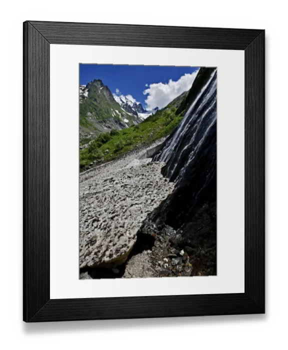 Framed Print : Water flowing down a rock face and underneath a glacier, Amanauz Valley near Dombay Framed Print : Water flowing down a rock face and underneath a glacier, Amanauz Valley near Dombay
