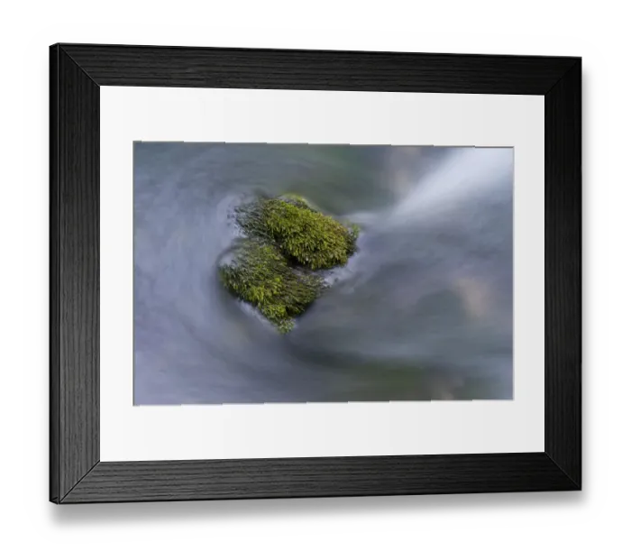 Framed Print : Water flowing round moss covered stones in the Crna Rijeka, Black river springs
