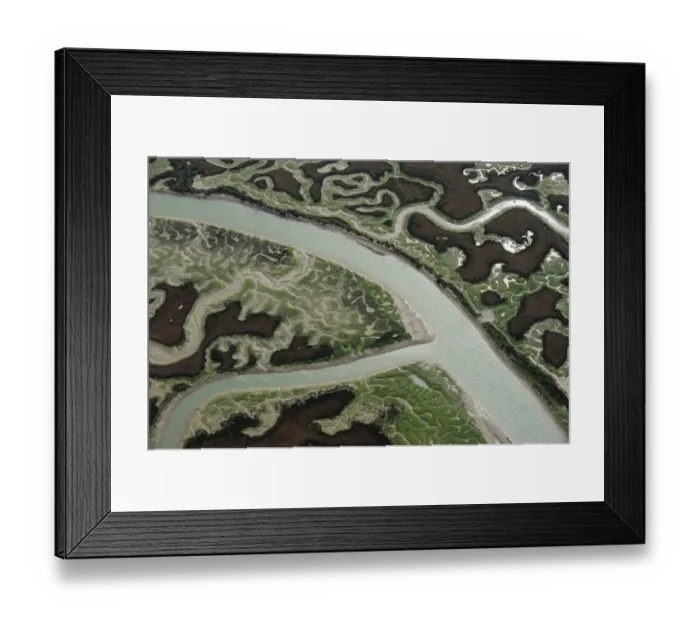 Framed Print : Aerial view of marshes with Seaweed exposed at low tide, Baha de Cdiz Natural Park