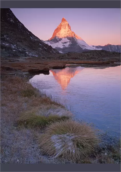 Matterhorn (4, 478m) at sunrise with reflection in Riffel Lake, Wallis, Switzerland