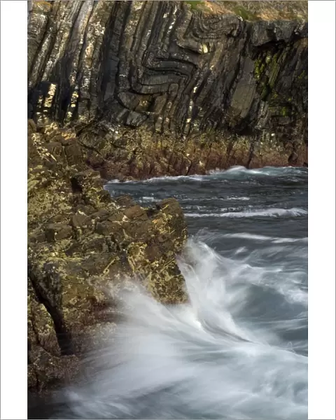 Waves hitting rocks at base of cliffs, Alentejo, Natural Park of South West Alentejano