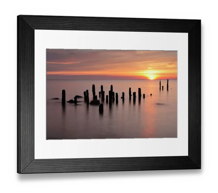 Framed Print : Baltic sea with posts sticking out of water at sunset, Latvia, June 2009 Framed Print : Baltic sea with posts sticking out of water at sunset, Latvia, June 2009