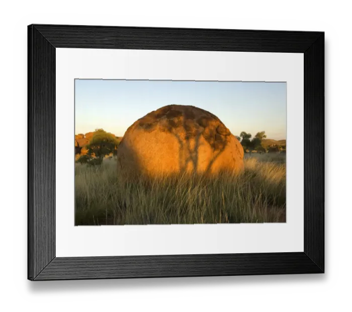 Framed Print : The Devils Marbles, a series of sandstone rocks perched at seemingly impossible angles Framed Print : The Devils Marbles, a series of sandstone rocks perched at seemingly impossible angles